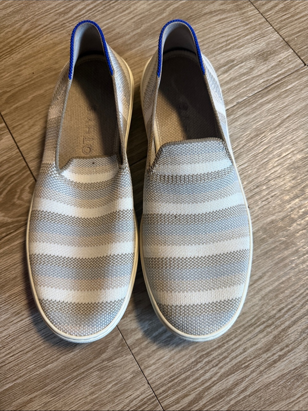 Rothy's Woman’s Slip-On Knit Loafers in White and Gray with Blue Trim